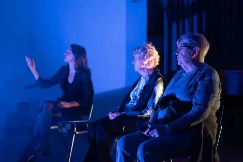 Two elderly ladies and Sara Renar singing